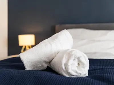 Ein Bett oder Betten in einem Zimmer der Unterkunft Arena in der Nähe - Tiefgarage - Balkon - Küche - Smart TV