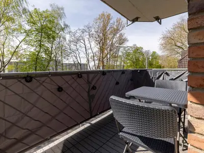 Ein Balkon oder eine Terrasse in der Unterkunft Arena in der Nähe - Tiefgarage - Balkon - Küche - Smart TV