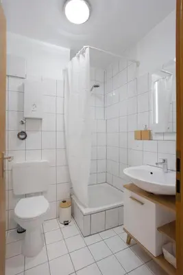 Ein Badezimmer in der Unterkunft MINT: Design Studio – Parken – Küche – WiFi