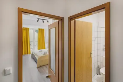 Ein Bett oder Betten in einem Zimmer der Unterkunft MINT: Design Studio – Parken – Küche – WiFi