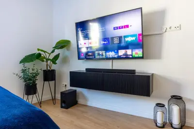 TV/Unterhaltungsangebot in der Unterkunft Uniklinik-Nähe Modernes Apartment, mit Balkon