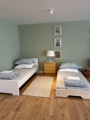 Ein Bett oder Betten in einem Zimmer der Unterkunft Emmas Lofts