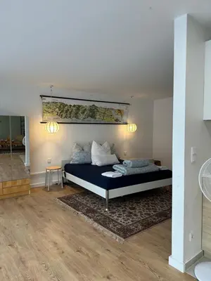 Ein Bett oder Betten in einem Zimmer der Unterkunft Emmas Lofts