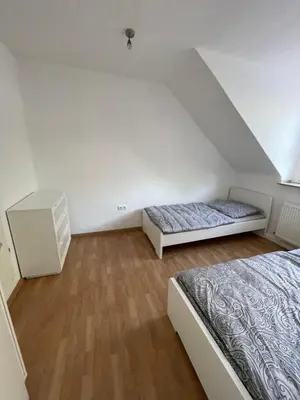 Ein Bett oder Betten in einem Zimmer der Unterkunft Günstiges Apartment Gelsenkirchen Schalke