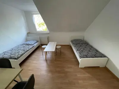 Ein Bett oder Betten in einem Zimmer der Unterkunft Günstiges Apartment Gelsenkirchen Schalke