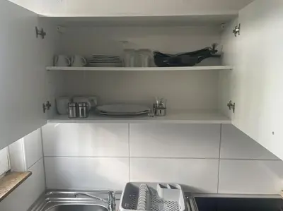 Küche/Küchenzeile in der Unterkunft Schöne Appartement mit kostenlosen Parkplätze AVD1