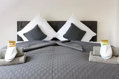 Ein Bett oder Betten in einem Zimmer der Unterkunft Luxus über 2 Etagen mit Balkon in Elberfeld