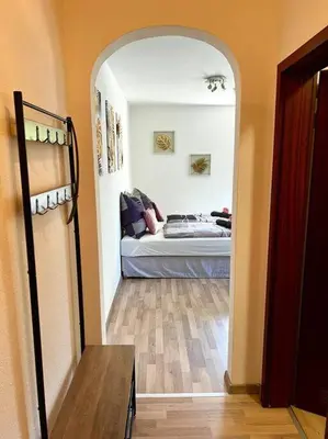 Ein Bett oder Betten in einem Zimmer der Unterkunft Zuhause im Ruhrgebiet 2 mit Balkon