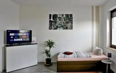 Ein Bett oder Betten in einem Zimmer der Unterkunft Wohnung für 1 bis 3 Personen