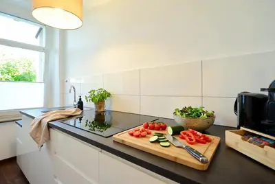 Küche/Küchenzeile in der Unterkunft MILPAU Wuppertal 1 - Modernes Studio mit privater Terrasse & Queensize-Bett