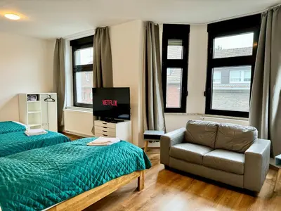 Ein Bett oder Betten in einem Zimmer der Unterkunft 3 Rooms, free Parking, 25 min to Düsseldorf, 200 Mbps WLAN