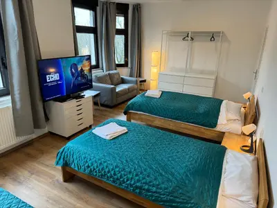 Ein Bett oder Betten in einem Zimmer der Unterkunft 3 Rooms, free Parking, 25 min to Düsseldorf, 200 Mbps WLAN