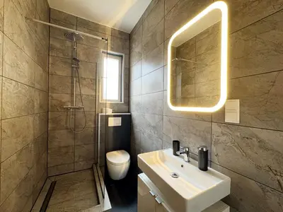 Ein Badezimmer in der Unterkunft Huge apartment with Sauna and free parking