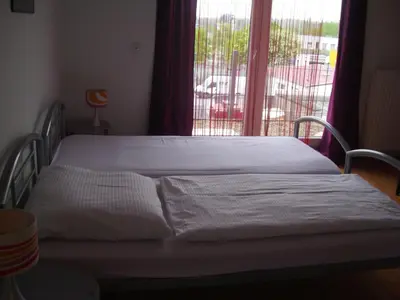 Ein Bett oder Betten in einem Zimmer der Unterkunft Casa Rose