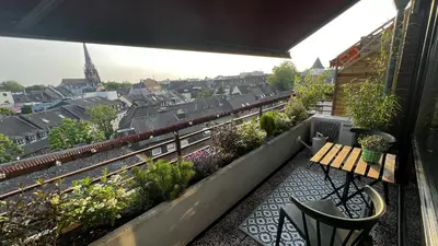 Ein Balkon oder eine Terrasse in der Unterkunft BOSTEL 88 - Apartment, Altstadt, Klimaanlage, Aufzug, Hunde willkommen