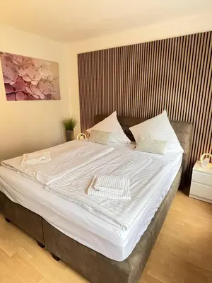 Ein Bett oder Betten in einem Zimmer der Unterkunft Fewo an der Stever