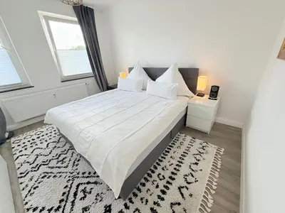Ein Bett oder Betten in einem Zimmer der Unterkunft Seibel's SUITES - Wohnung Ruhrgebiet inkl Garage