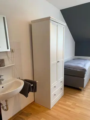 Ein Bett oder Betten in einem Zimmer der Unterkunft Pension Pagalies