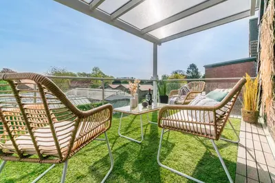 Ein Balkon oder eine Terrasse in der Unterkunft NICE & CALM - Wohlfühl-Wohnung in Stadtnähe für Familien oder Freunde