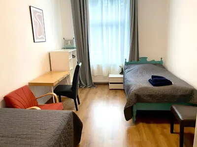 Ein Bett oder Betten in einem Zimmer der Unterkunft 2 Rooms, free Parking, 25 min to Düsseldorf, 150 Mbps WLAN