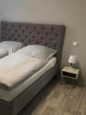 Ein Bett oder Betten in einem Zimmer der Unterkunft RÜ Business Apartments & Suites