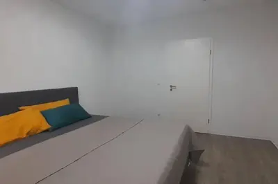 Ein Bett oder Betten in einem Zimmer der Unterkunft Schöne Klasse Apartment nähe Veltins Arena
