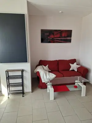 Ein Sitzbereich in der Unterkunft Innenstadt Appartement Essen