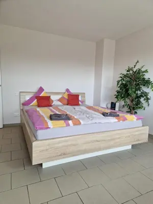 Ein Bett oder Betten in einem Zimmer der Unterkunft Innenstadt Appartement Essen
