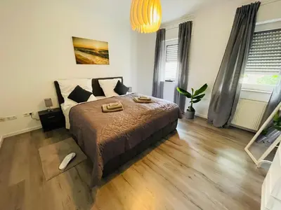 Ein Bett oder Betten in einem Zimmer der Unterkunft gemütlich*Nespresso*Netflix*Arbeitsplatz*Parkplatz