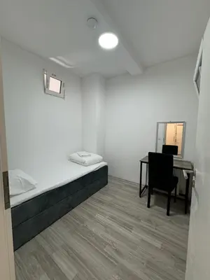 Ein Bett oder Betten in einem Zimmer der Unterkunft Apartment am Gustav-Lübcke Museum - Hbf