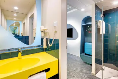 Ein Badezimmer in der Unterkunft Prize by Radisson, Dortmund City