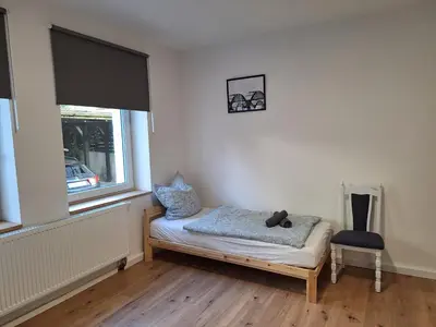 Ein Bett oder Betten in einem Zimmer der Unterkunft Hagen