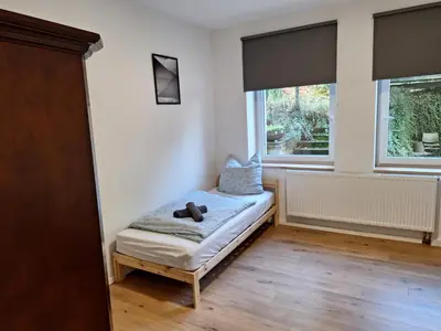 Ein Bett oder Betten in einem Zimmer der Unterkunft Hagen