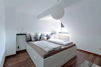 Ein Bett oder Betten in einem Zimmer der Unterkunft Top Equipment Netflix Wi-Fi Messe Uniklinik