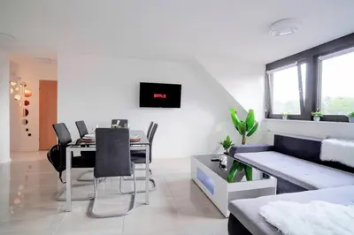 TV/Unterhaltungsangebot in der Unterkunft Top Equipped Netflix WLAN CentrO OLGA-Park