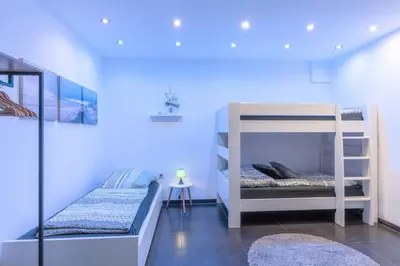 Ein Bett oder Betten in einem Zimmer der Unterkunft Top Ausstattung Netflix WLAN CentrO OLGA-Park