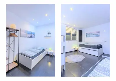 Ein Bett oder Betten in einem Zimmer der Unterkunft Top Ausstattung Netflix WLAN CentrO OLGA-Park