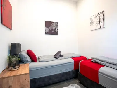 Ein Bett oder Betten in einem Zimmer der Unterkunft Serviceroom24 - Apartment 1 in Recklinghausen Hoch WLAN - Smart-TV - 24-7 Check-in und Küche