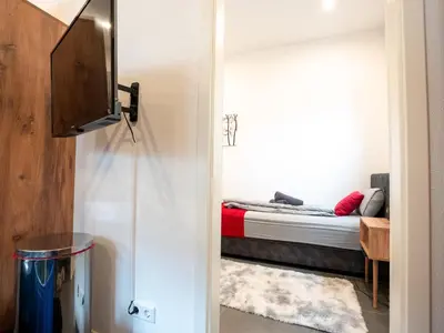 Ein Bett oder Betten in einem Zimmer der Unterkunft Serviceroom24 - Apartment 1 in Recklinghausen Hoch WLAN - Smart-TV - 24-7 Check-in und Küche