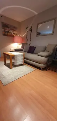 Ein Sitzbereich in der Unterkunft Garden Apartment
