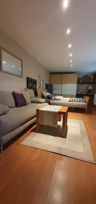 Ein Sitzbereich in der Unterkunft Garden Apartment