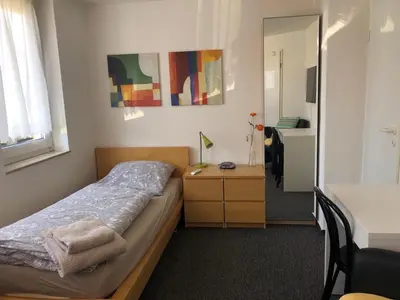 Ein Bett oder Betten in einem Zimmer der Unterkunft Apartmenthaus Somborn