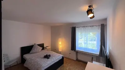 Ein Bett oder Betten in einem Zimmer der Unterkunft Apartmenthaus Somborn