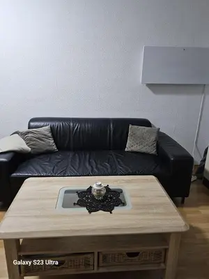 Ein Sitzbereich in der Unterkunft M&L Wohnen 2