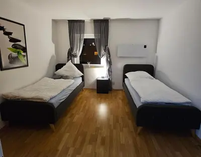 Ein Bett oder Betten in einem Zimmer der Unterkunft M&L Wohnen 2