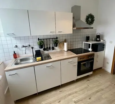 Küche/Küchenzeile in der Unterkunft Perfekt für 5 - Stylisch & Zentral - Küche