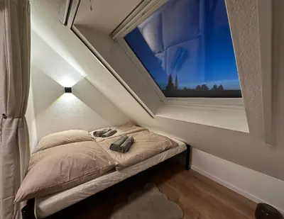 Ein Bett oder Betten in einem Zimmer der Unterkunft Ferienwohnung Dortmund - Elias - Adults Only