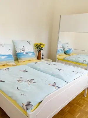 Ein Bett oder Betten in einem Zimmer der Unterkunft Penthaus Kranichholz