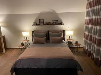 Ein Bett oder Betten in einem Zimmer der Unterkunft Excl. Maisonette Ferienwohnung