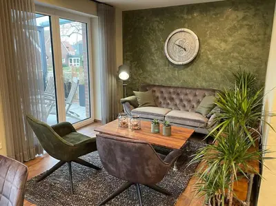 Ein Sitzbereich in der Unterkunft Excl. Maisonette Ferienwohnung